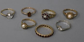 Seven assorted 9ct gold and gem set dress rings.
