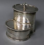 A Victorian silver combination tobacco and cigarette box, of oval form, with gadrooned rims, the