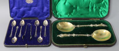 A pair of Victorian silver-gilt apostle serving spoons and a set of six silver coffee spoons and