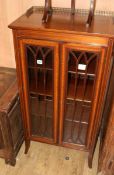 An Edwardian satinwood banded mahogany two door china display cabinet W.58cm