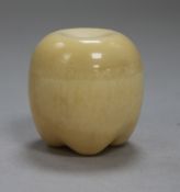 A Japanese ivory model of a fruit, with screw top