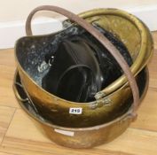 A brass preserving pan and a brass coal scuttle