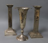 A pair of Gorham sterling silver candlesticks of Doric form and a Shreve & Co specimen vase, the