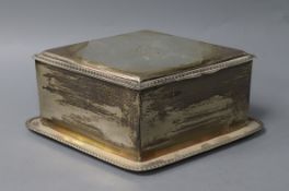 A Victorian silver biscuit box of lozenge form, with ropetwist decoration to edges, engraved
