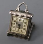 A 1920's engine turned silver Rolex travelling pendant watch, case 30mm.