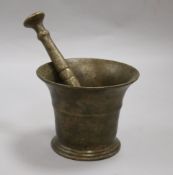 An 18th century bronze pestle and mortar mortar height 12cm