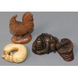 Four Japanese netsuke: one bronze, a cockerel, a dragon and figure on a gourd