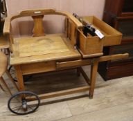 An early 20th century De Grave, Short & Co weighing seat W.97cm arms extended