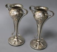 A pair of Edwardian Art Nouveau silver presentation bud vases, the bowls of bulbous form, embossed
