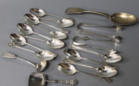 An early Victorian silver caddy spoon, assorted silver teaspoons and six plated teaspoons.