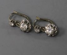 A pair of early 20th century French 18ct white gold and diamond set drop earrings, 22mm.