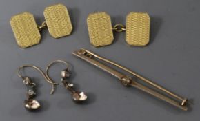 A pair of engine-turned 18ct gold cufflinks and two other items, including a yellow metal diamond-