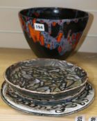 A collection of Art pottery plates and dishes, signed