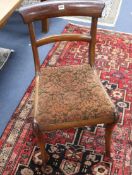 A set of four Regency mahogany dining chairs and a pair of Regency style brass inlaid elbow