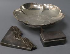 A Japanese sterling silver bowl, a similar stamp box and a set of four white metal corner mounts the