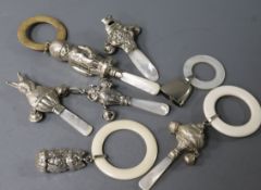 Seven assorted early 20th century and later silver child's rattles with teethers, including owl