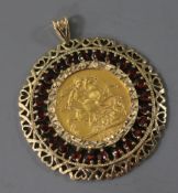 A George V gold sovereign, 1912, in a 9ct gold pendant mount