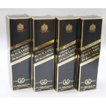 Four boxed bottles of Johnnie Walker Extra Special Black Label 12 year old whisky