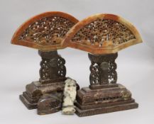 A pair of soapstone fan carvings on stands H.29cm. (fans)