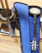 A Banjo, three banjolele and one ukelele