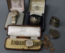 Two watches, a pocket watch, silver napkin ring and lighter, a gold coloured bracelet with a 9ct