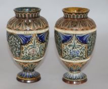 A pair of Doulton Lambeth reticulated pate sur pate decorated vases, dated 1883, decorator's mark