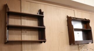 A mahogany three tier wall shelf and a mirrored wall shelf W.59cm