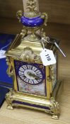 A 19th century French gilt brass and porcelain mounted mantel clock