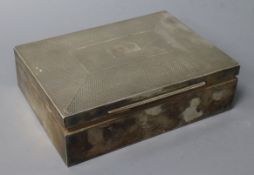 A 1930's engine silver cigarette box, 16cm.
