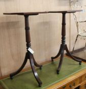 A pair of mahogany tripod tables