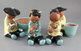Gudrun Baudisch (1907-1982). A set of four Wiener Werkstatte tin glazed terracotta figures of