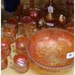 A pair of Carnival glass 'crucifix' candlesticks and a collection of other marigold Carnival