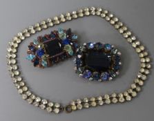 A paste brooch attributed to Miriam Haskell, together with a costume necklace and brooch.