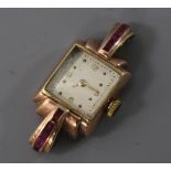 A lady's 1940's/1950's 9ct gold and gem set manual wind cocktail watch (no strap).