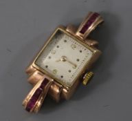 A lady's 1940's/1950's 9ct gold and gem set manual wind cocktail watch (no strap).