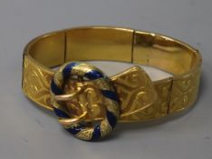 A Victorian engraved gold and blue enamel "buckle" bracelet (a.f),