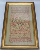 A George IV needlework sampler, Matilda White 1823 46 x 25cm