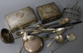 Minor silver cutlery including a William IV caddy spoon, a silver toast rack, two cigarette boxes