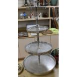 A large metal four tier cake stand height 87cm
