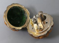 An early 20th century white metal mounted etui, modelled as a walnut (a.f.), 50mm.