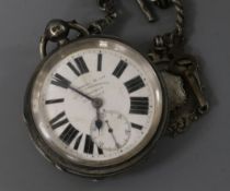 A late Victorian silver pocket watch, on a silver albert chain.