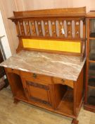 An Arts & Crafts marble topped side cabinet W.107cm