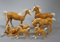 Seven Beswick figures of Palomino horses and foals