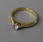 An 18ct gold solitaire diamond ring, size H.