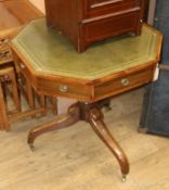 A Regency sytle octagonal mahogany drum table, with leather top W.70cm