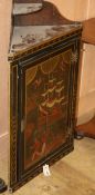 An 18th century Dutch lacquered hanging corner cabinet