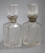 A pair of Continental silver mounted decanters height 26cm incl. stopper