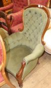A Victorian mahogany framed buttoned back spoonback armchair