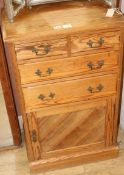 A pine cupboard with drawers W.61cm