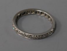 A white metal and diamond full eternity ring, size P.